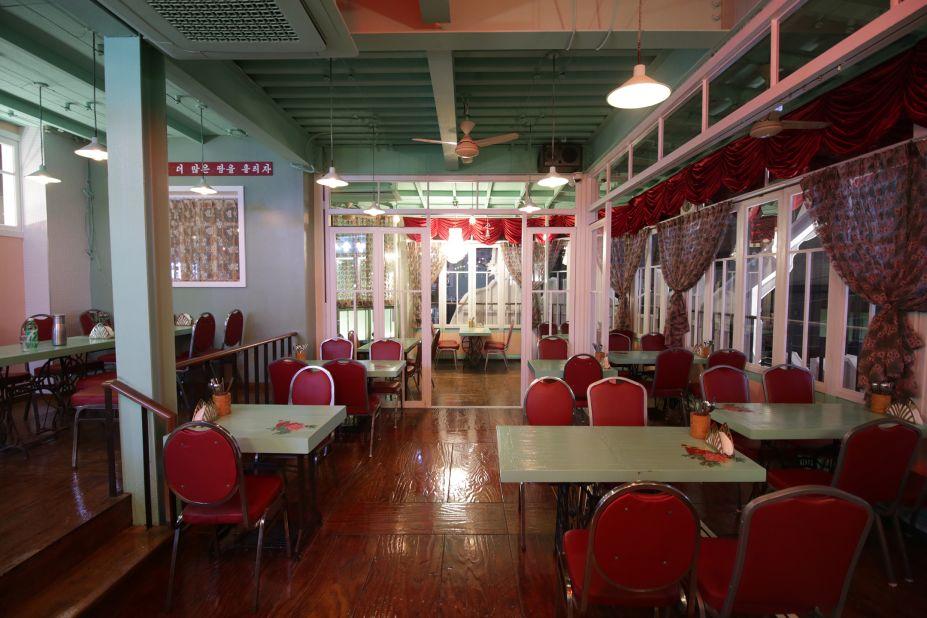 <strong>Peeking in:</strong> A look inside Pyongyang Pub, which has North Korean-style decor.